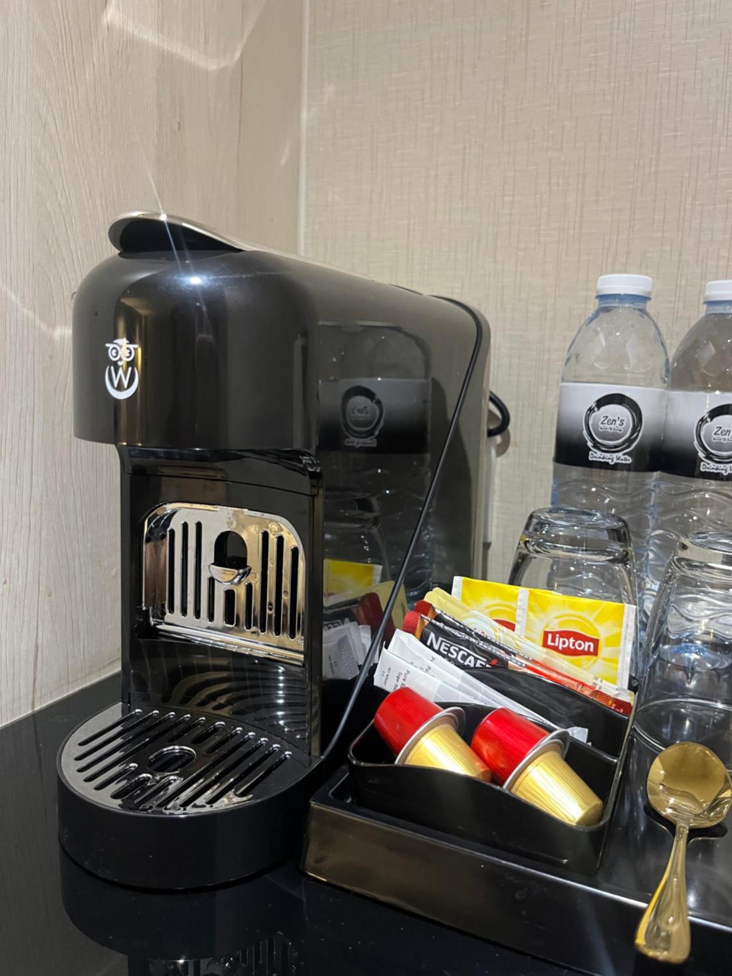 Zenseana Resort & Spa - Sha Plus Patong Eksteriør billede A Nespresso machine